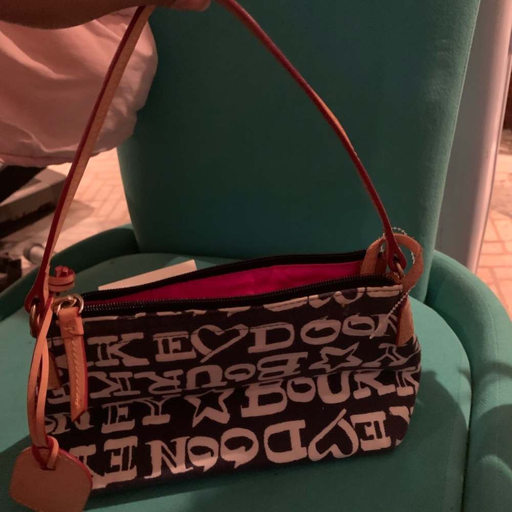 Navy blue and white Dooney and Burke bag